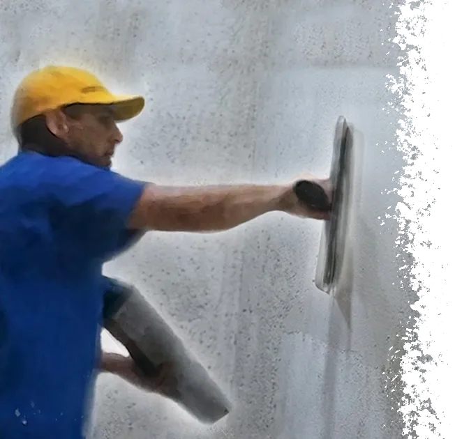 Ronny Barrera aplicando texturizado de drywall con una llana